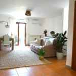 Soggiorno con angolo cottura Jannuzzi House
